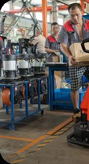 Worker with automated warehouse equipment